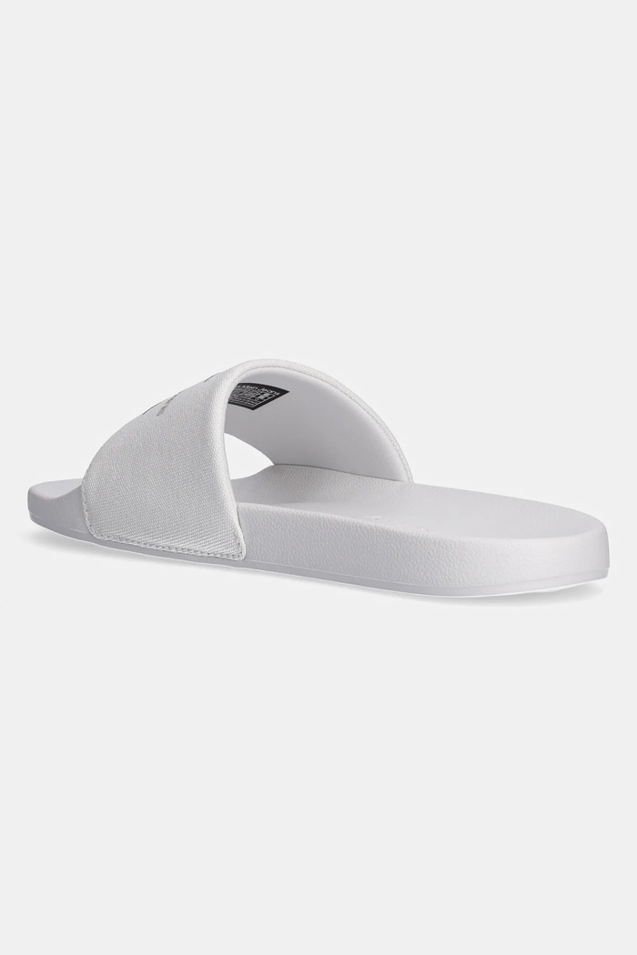 Obuwie Calvin Klein Jeans Klapki SLIDE MONOGRAM YM0YM01271 biały