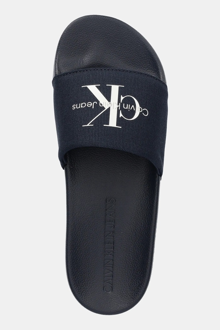 Calvin Klein Jeans klapki SLIDE MONOGRAM granatowy YM0YM01271