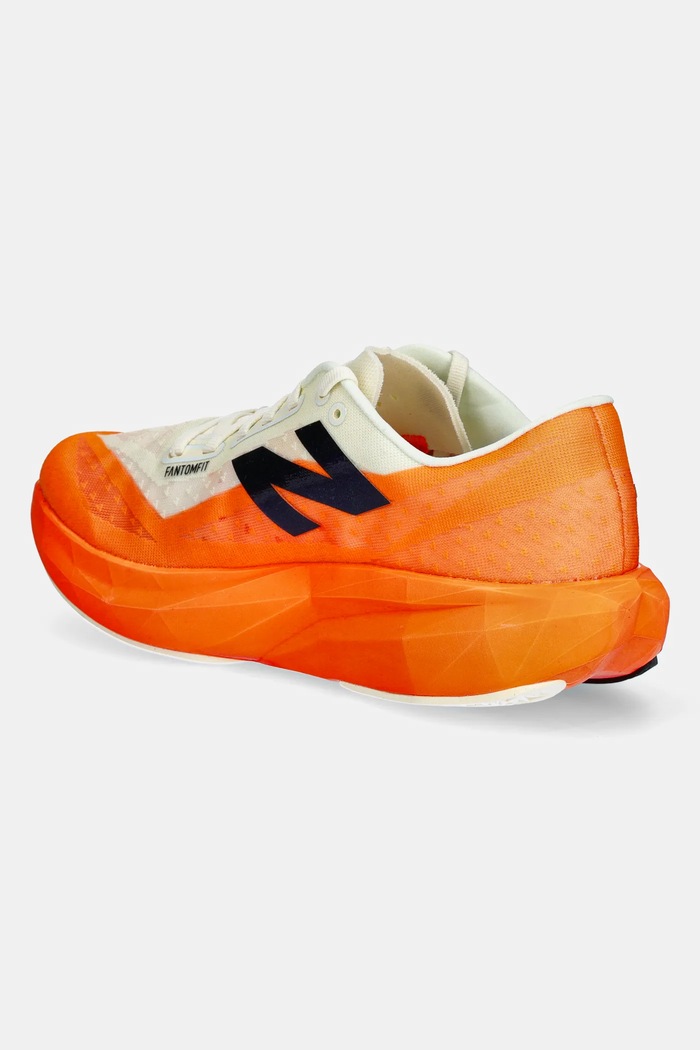 Obuwie New Balance Buty do biegania FuelCell Rebel v4 MFCXCO4 pomarańczowy