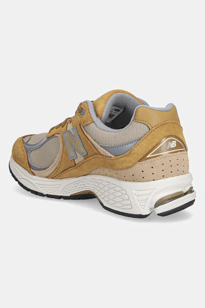 Obuwie New Balance sneakersy U2002 U2002RCE brązowy