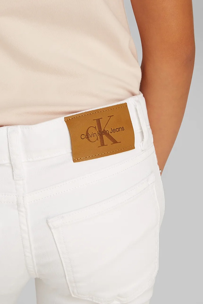 Dječje traperice Calvin Klein Jeans FLARE IG0IG02840.PPYA bijela