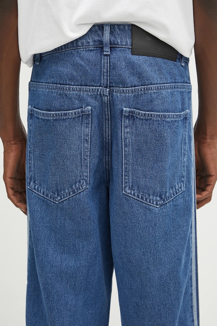 adidas Originals jeansy Firebird niebieski JC6234