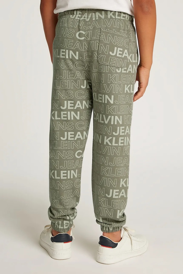Dječji pamučni donji dio trenirke Calvin Klein Jeans zelena IB0IB02345.PPYA