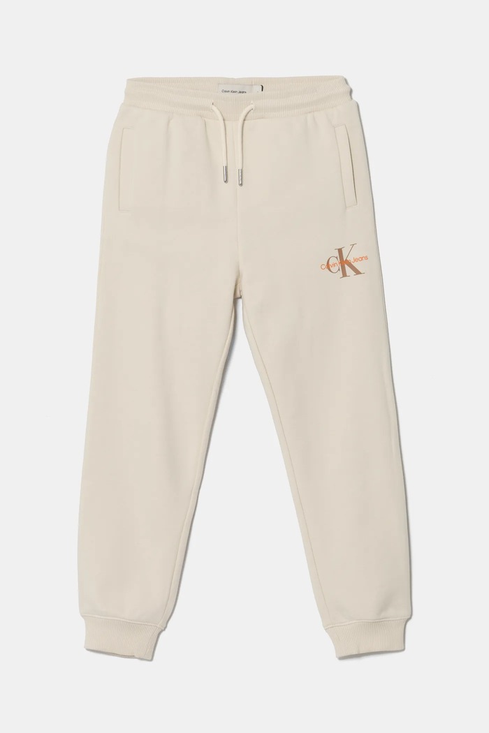Calvin Klein Jeans spodnie dresowe bawełniane dziecięce bawełna beżowy IU0IU00285.PPYA