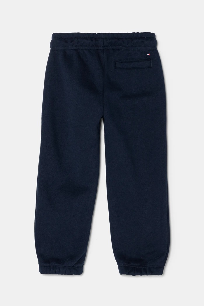 Dětské tepláky Tommy Hilfiger KS0KS00596.98.122.PPYA námořnická modř SS25