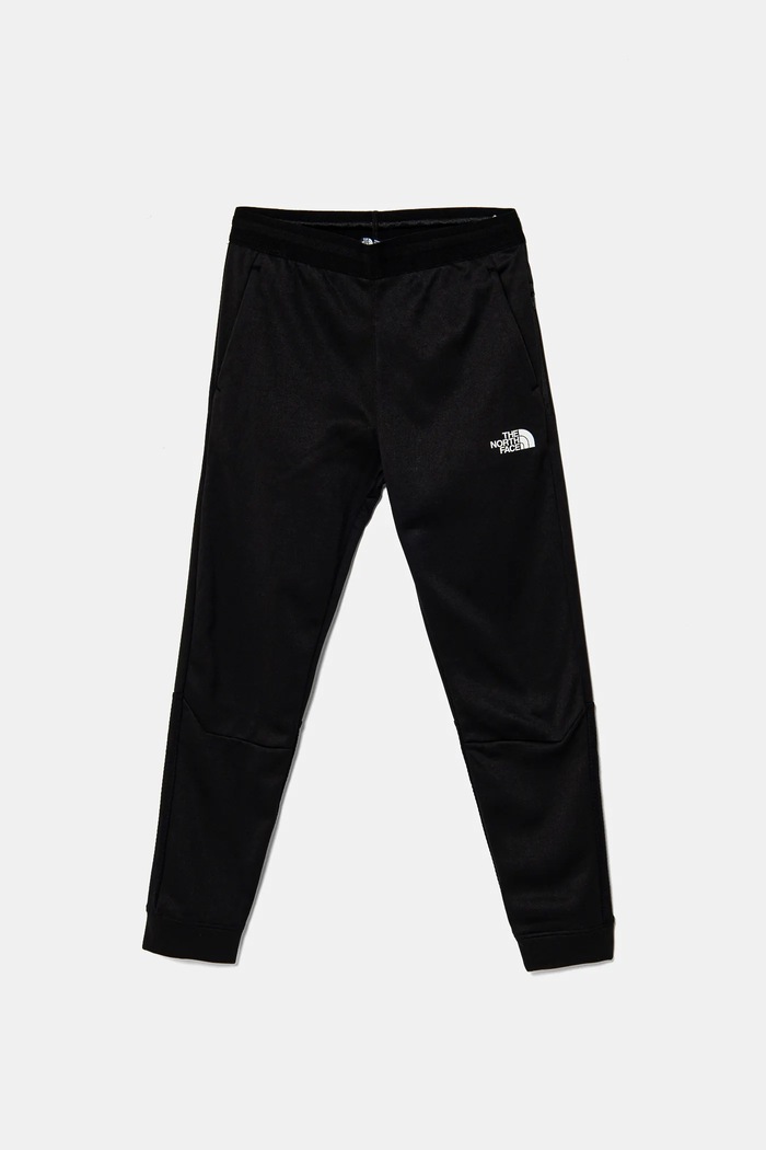 Otroški spodnji del trenirke The North Face MOUNTAIN ATHLETICS JOGGERS Pletenina črna NF0A89HWKY41
