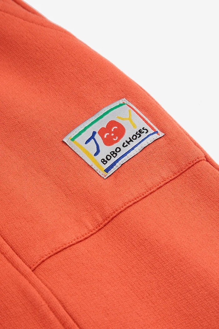 Dětské tepláky Bobo Choses Smiling oranžová 125AC078