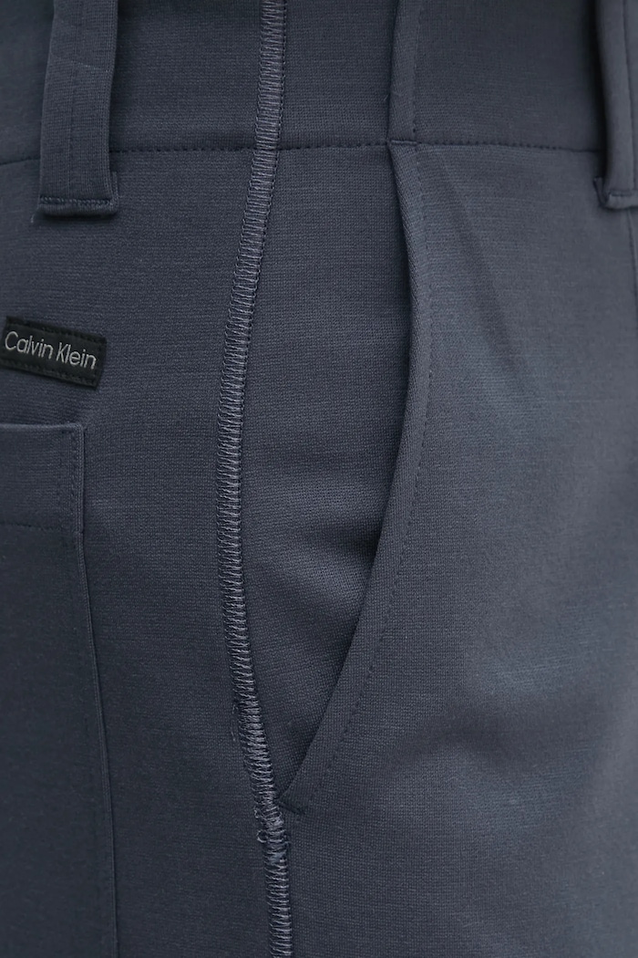 Nohavice Calvin Klein Jeans modrá J20J224850