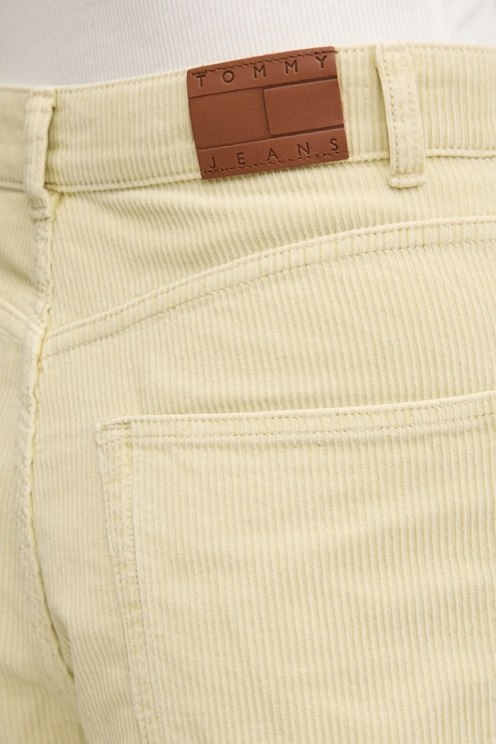 Manšestrové kalhoty Tommy Jeans žlutá DW0DW20557