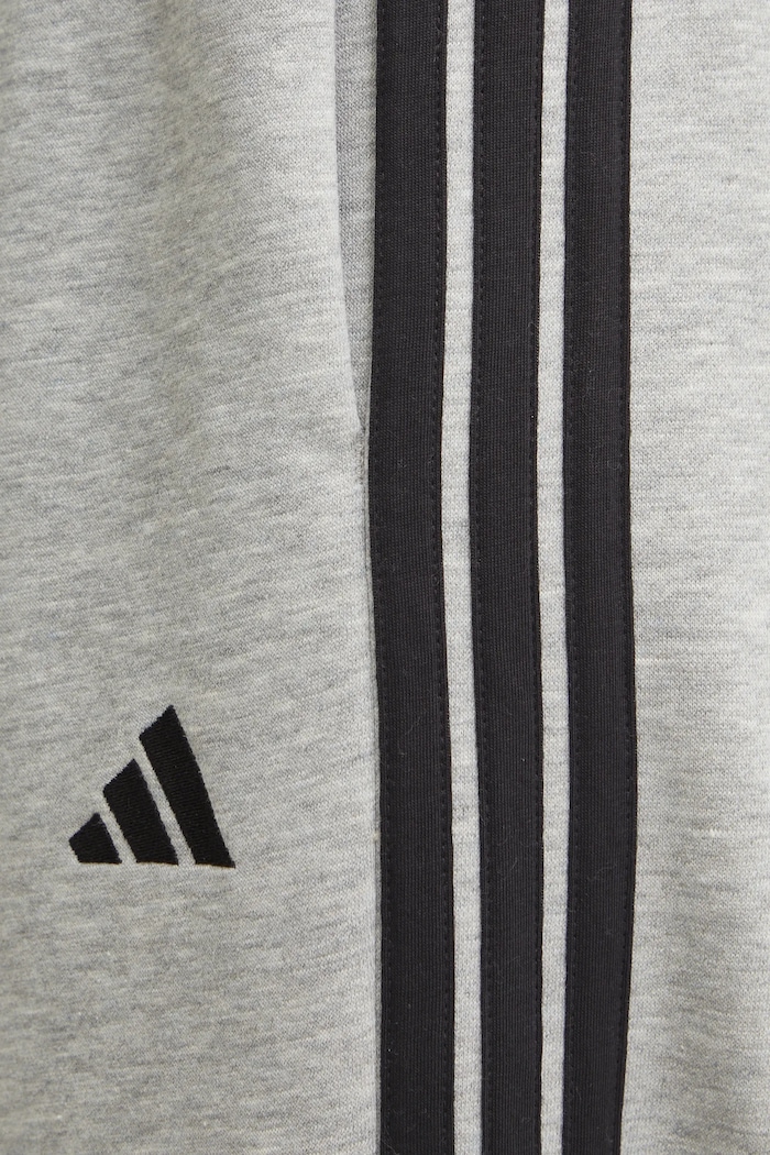 Tepláky adidas Essentials šedá JE1302