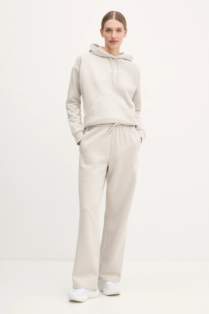 Tepláky adidas Essentials JW9215 béžová SS26