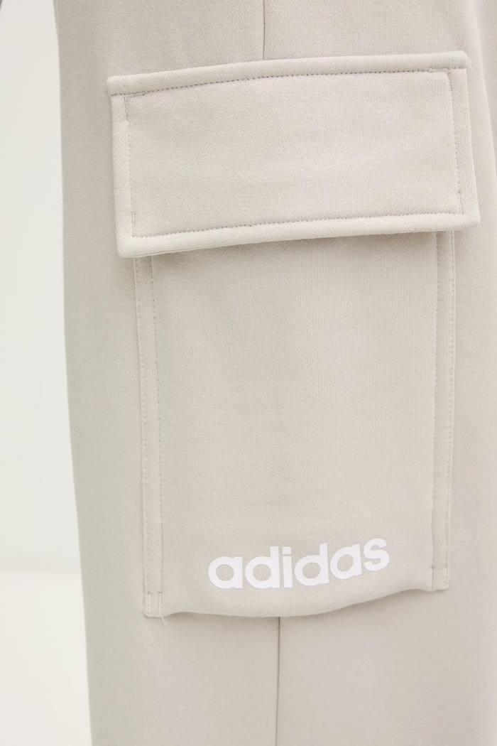 Pantaloni de trening Essentials Linear adidas bej JC5707
