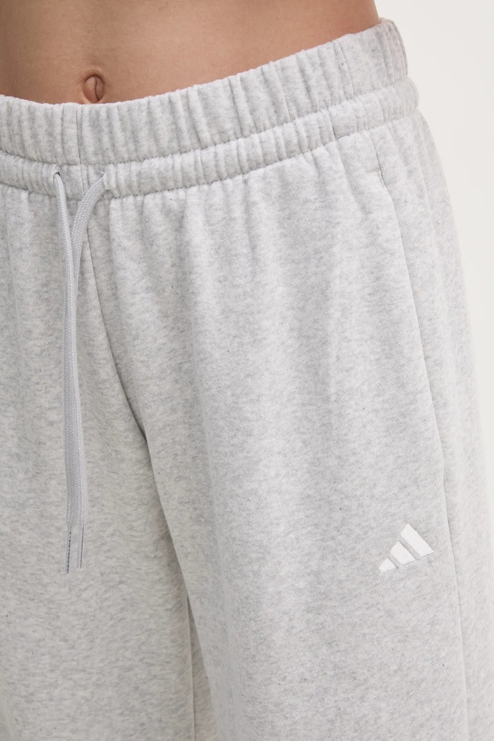 Tepláky adidas Essentials šedá JI6050