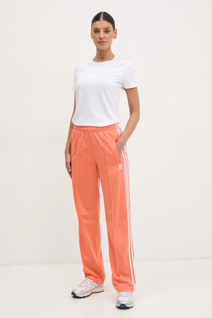 adidas Originals spodnie dresowe Firebird JC8286 pomarańczowy SS25