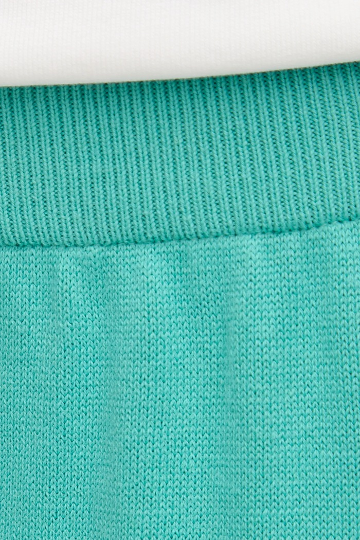 Bavlněné kalhoty United Colors of Benetton tyrkysová 1294DF00V