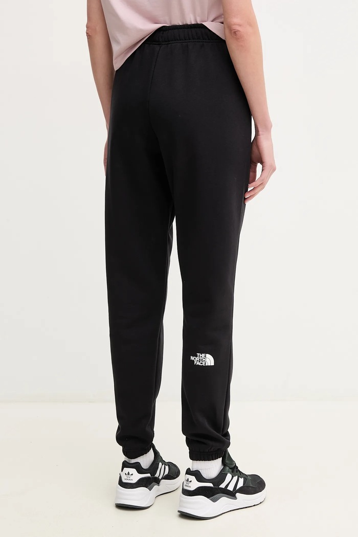 Odzież The North Face spodnie dresowe Simple Dome NF0A8C1YJK31 czarny