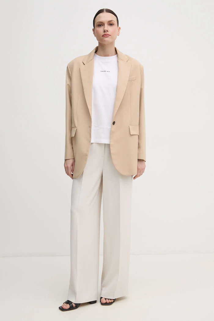 Calvin Klein spodnie K20K208214 beżowy SS25