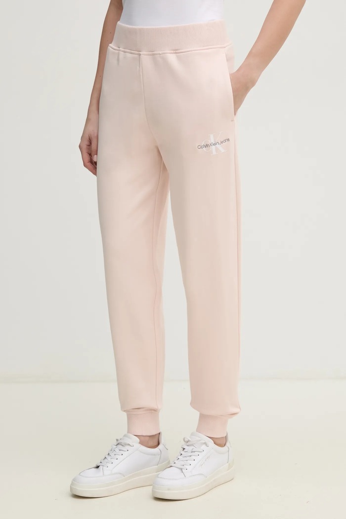 Bavlněné tepláky Calvin Klein Jeans pletenina růžová J20J225354