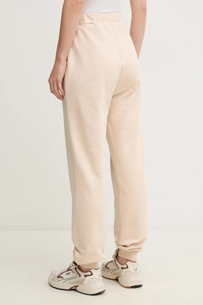 Odzież Calvin Klein Jeans spodnie dresowe bawełniane J20J225355 beżowy