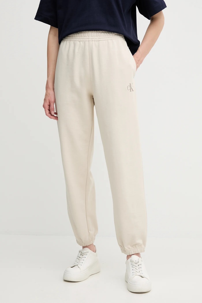 Спортен панталон Calvin Klein Jeans трикотаж бежов LV047B235G