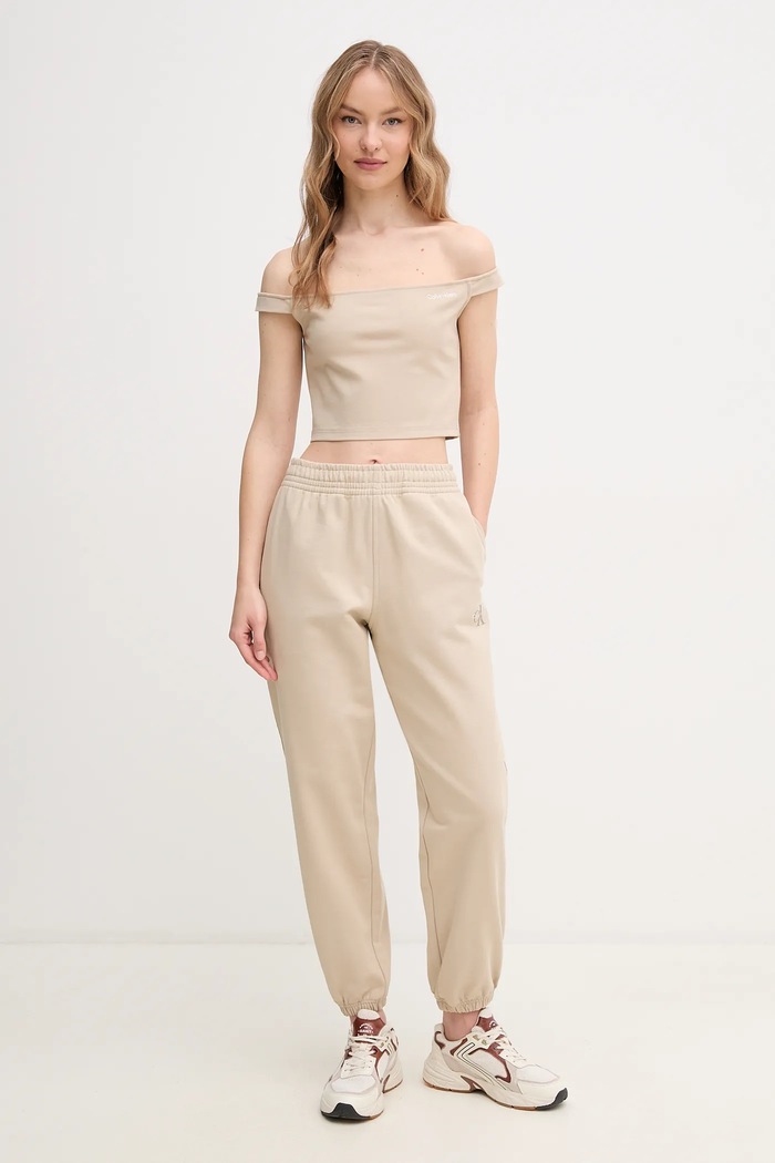Spodnji del trenirke Calvin Klein Jeans LV047B235G bež SS26