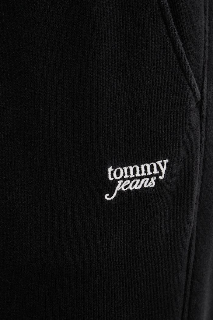 Bavlnené tepláky Tommy Jeans čierna DW0DW20670