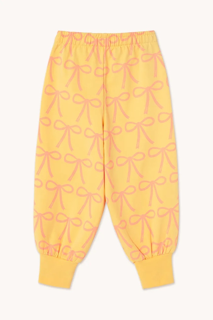 Dětské tepláky Tinycottons BOWS SWEATPANT SS25.057 žlutá SS25