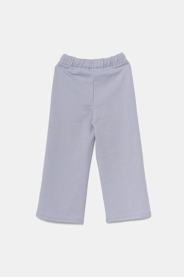 United Colors of Benetton spodnie dresowe bawełniane dziecięce 3UNICF061.G.Seasonal niebieski SS25