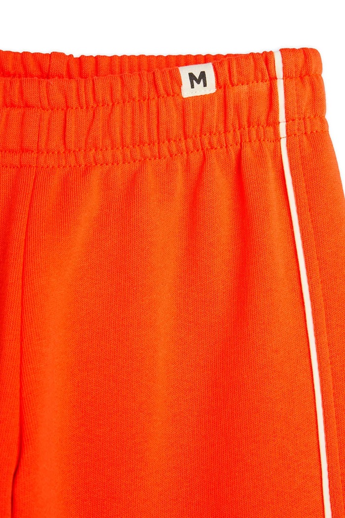 Dječji donji dio trenirke Mini Rodini Plain piping narančasta 2513010742
