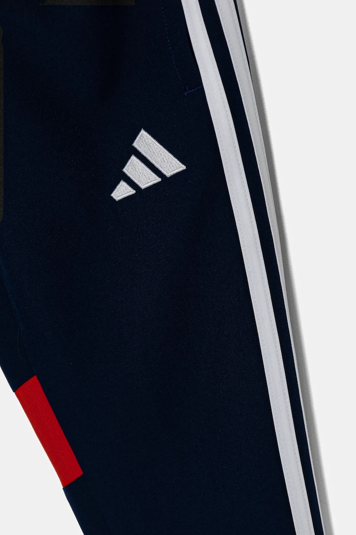 Dětské tepláky adidas Performance námořnická modř JD0636