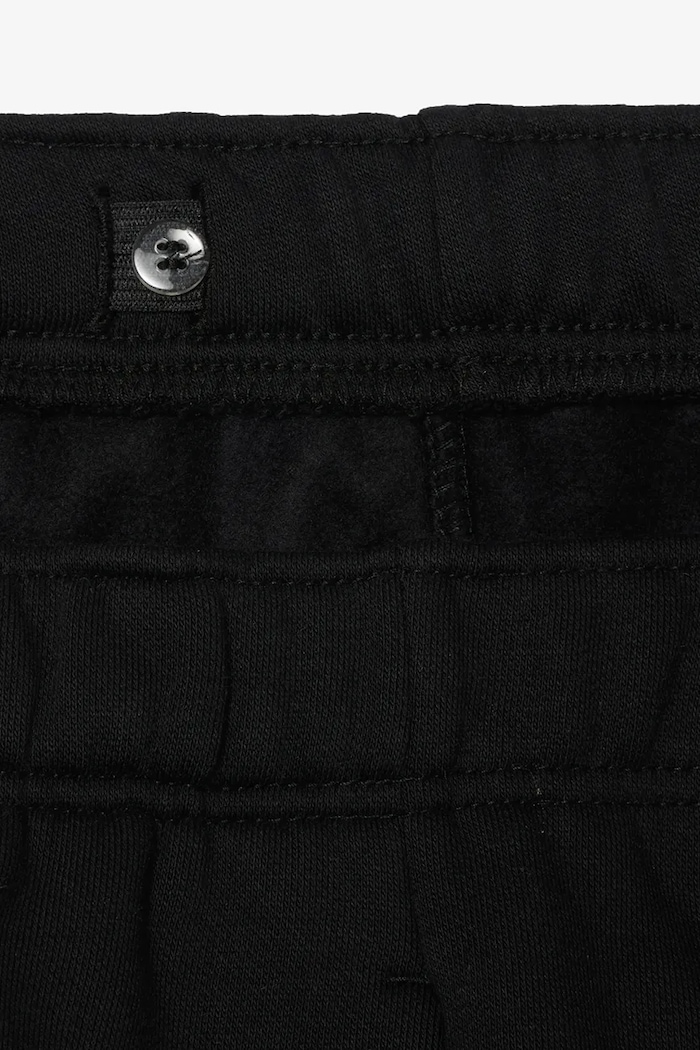 Detské tepláky Lacoste čierna XJ7345