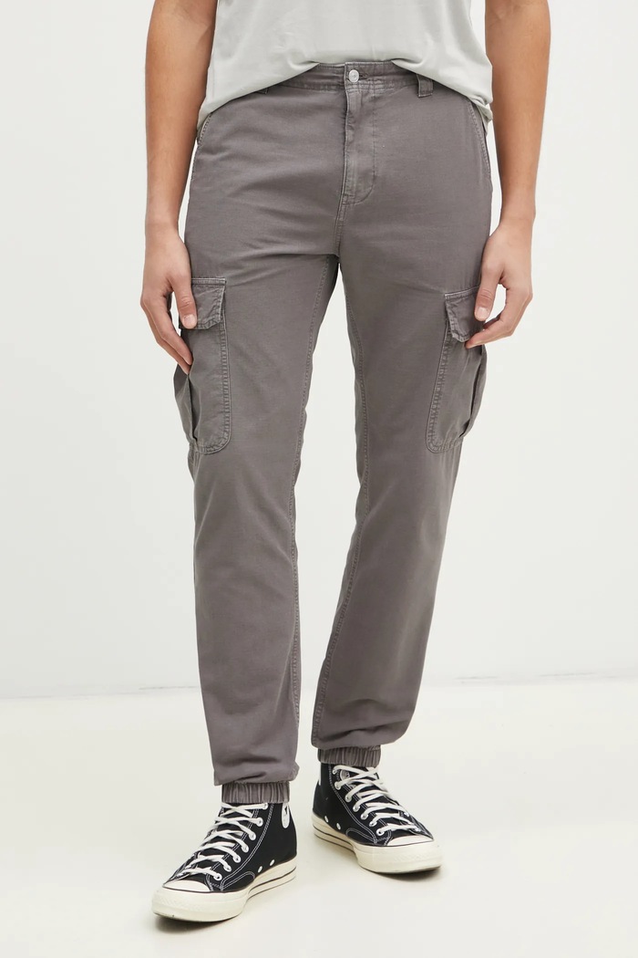Bavlněné kalhoty Tommy Jeans látka hnědá DM0DM20284