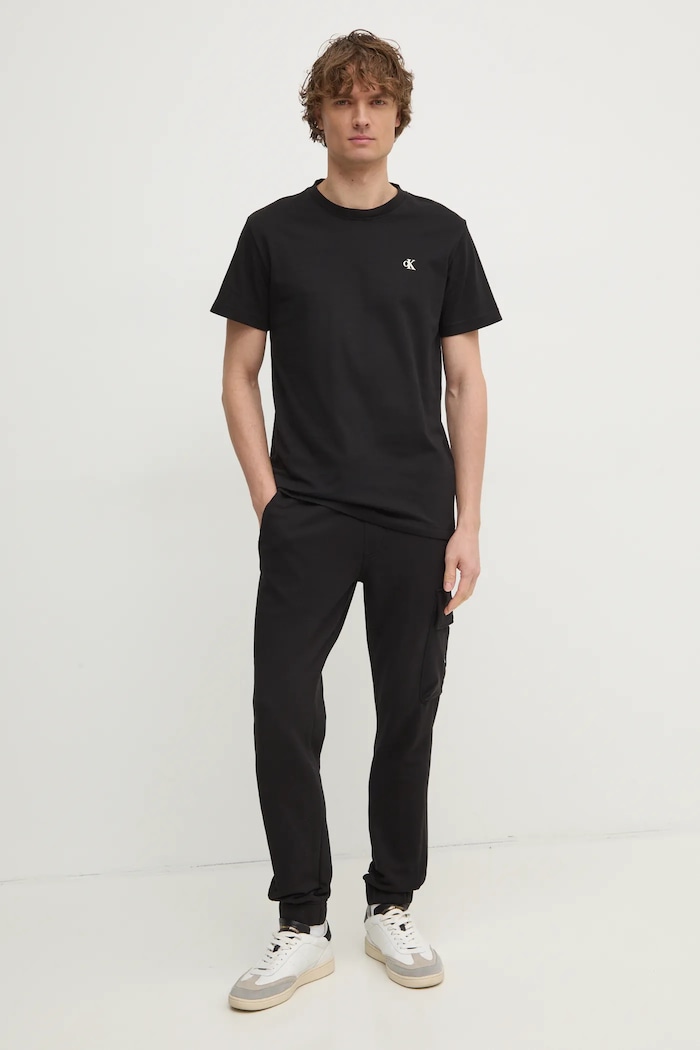 Bavlněné tepláky Calvin Klein Jeans J30J326762 černá SS25