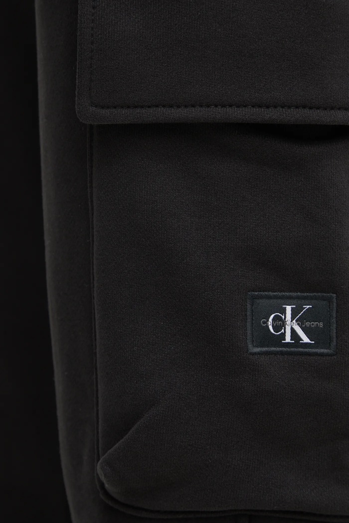 Bavlněné tepláky Calvin Klein Jeans černá J30J326762