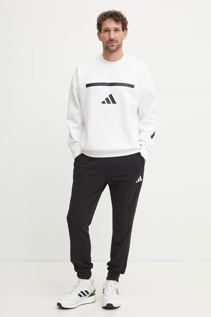 adidas melegítőnadrág Feelcozy JE3854 fekete SS25