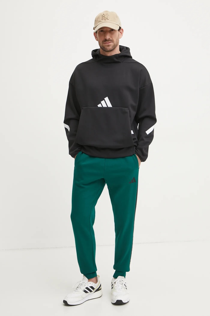 Tepláky adidas Essentials JD1860 zelená SS25