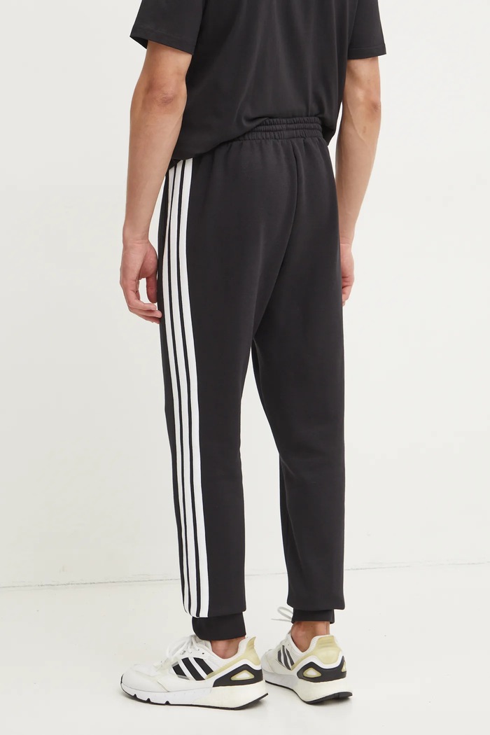Odjeća Donji dio trenirke adidas Essentials JD1861 crna