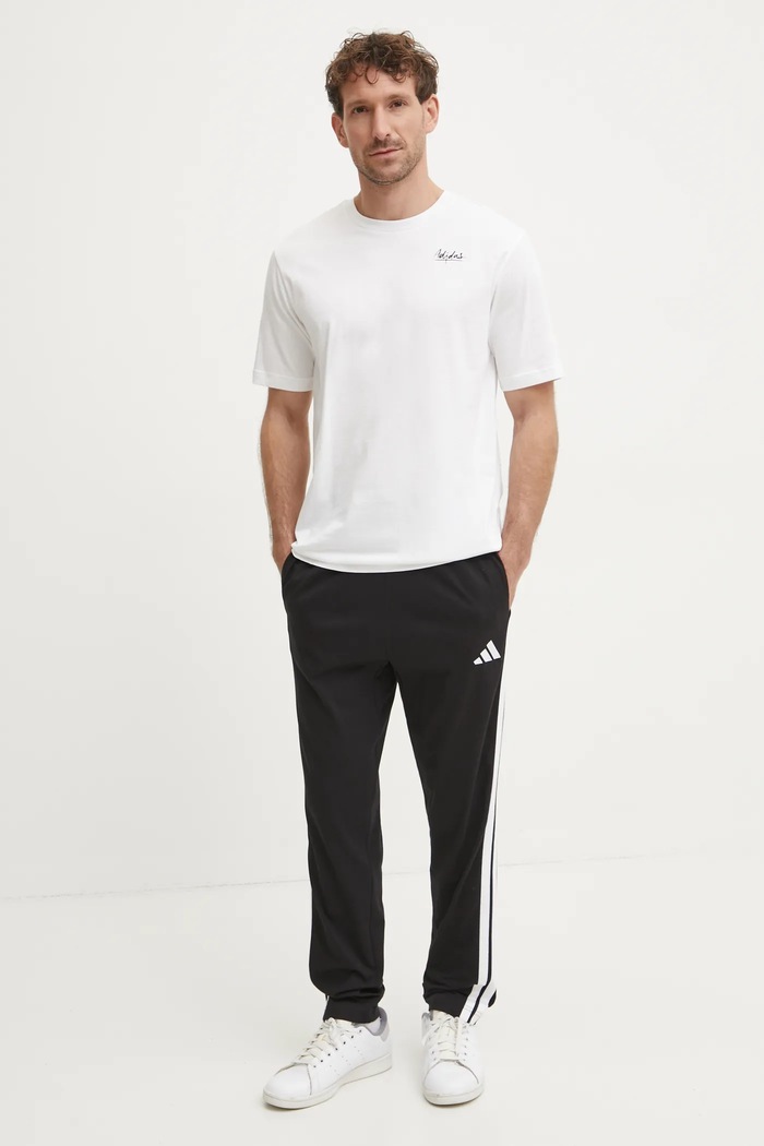 Donji dio trenirke adidas Essentials JE6430 crna SS25
