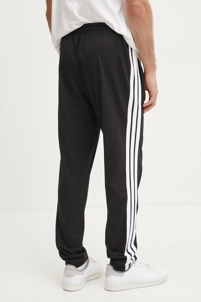 Odjeća Donji dio trenirke adidas Essentials JE6430 crna