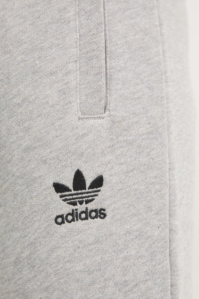 Bavlněné tepláky adidas Originals Essential šedá JD2424