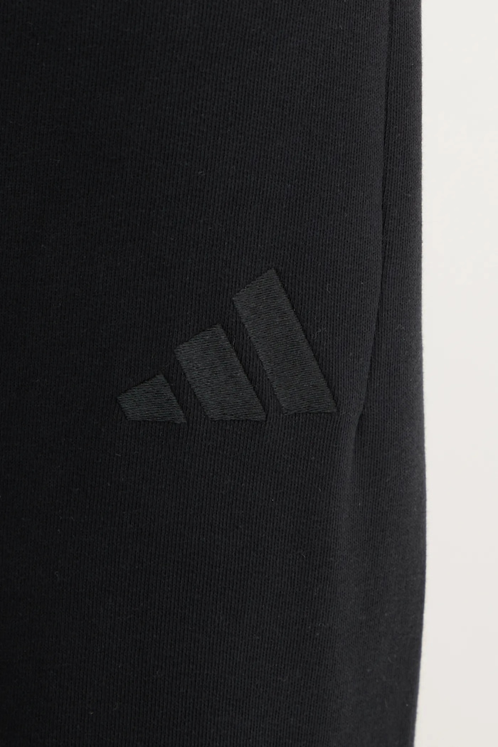 Bavlněné tepláky adidas ALL SZN černá IV5216
