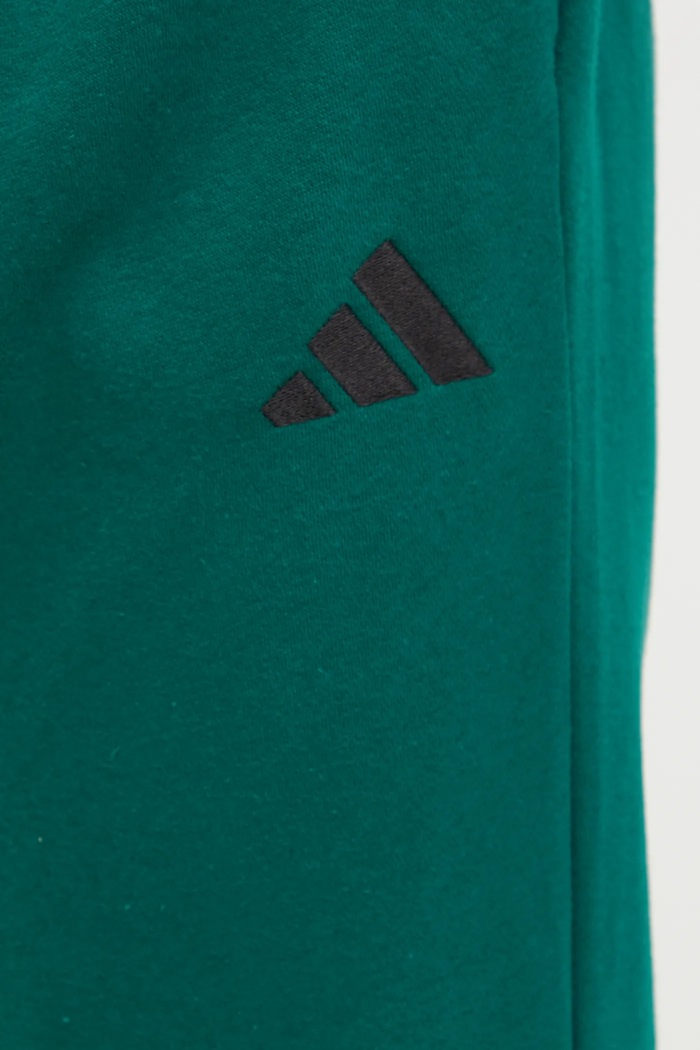 Tepláky adidas Feelcozy zelená IN6072