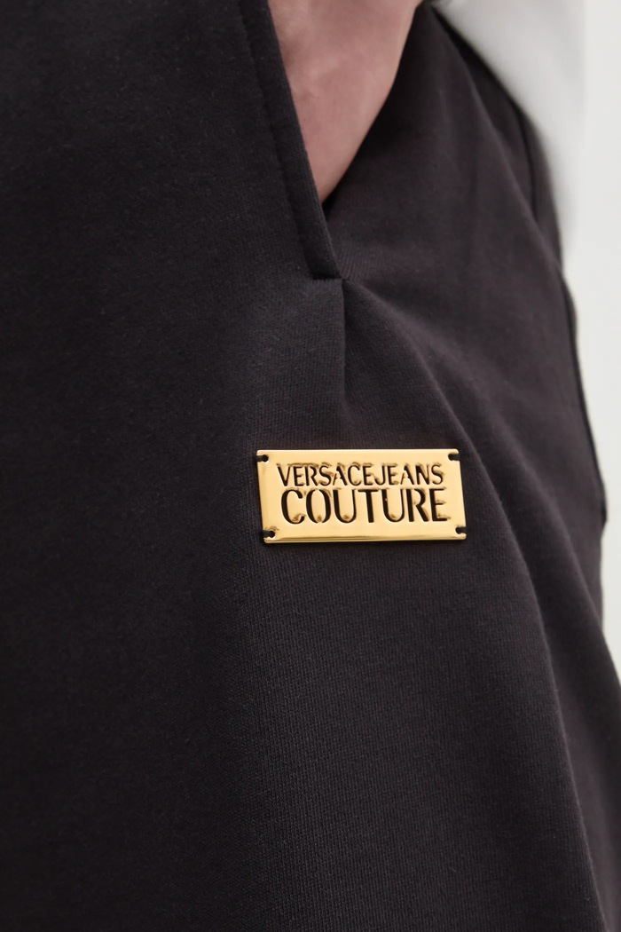 Bombažen spodnji del trenirke Versace Jeans Couture črna 78GAAT08.CF01T