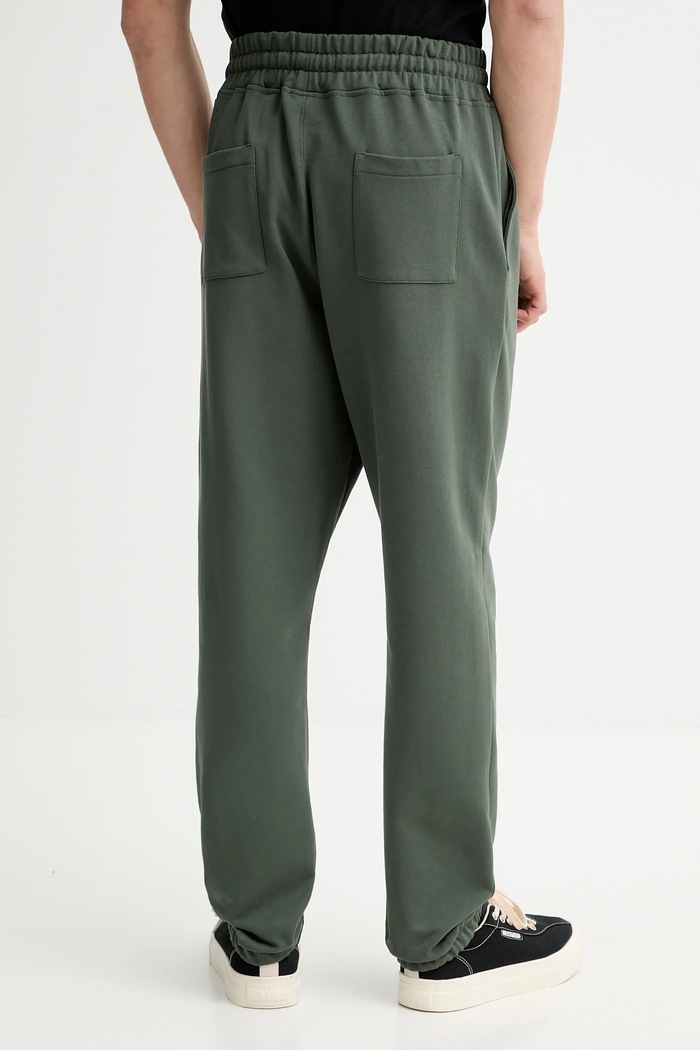 Oblečenie Bavlnené tepláky AllSaints UNDRGRND M031TB zelená