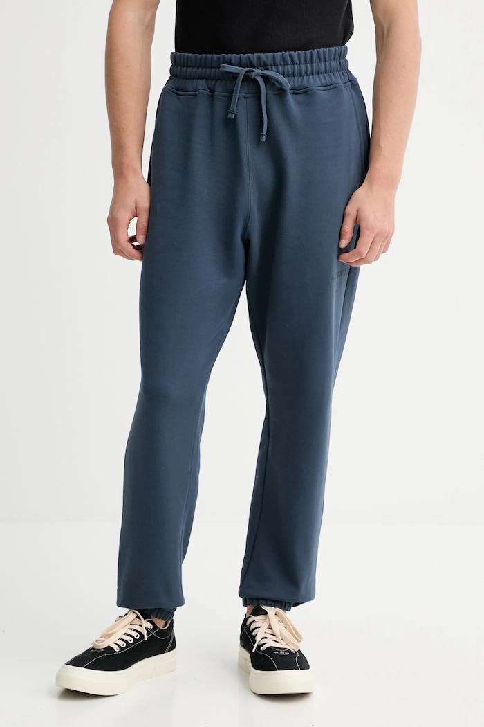 Bavlnené tepláky AllSaints UNDRGRND bavlna modrá M031TB