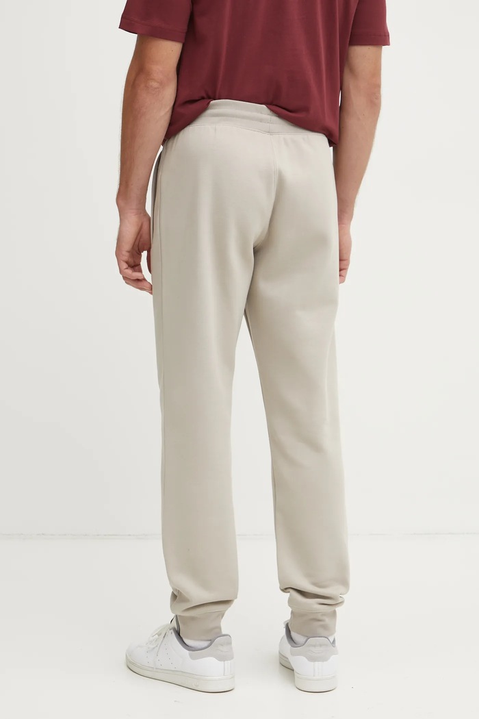 Odzież adidas Originals spodnie dresowe MESSI PANTS JC9493 beżowy