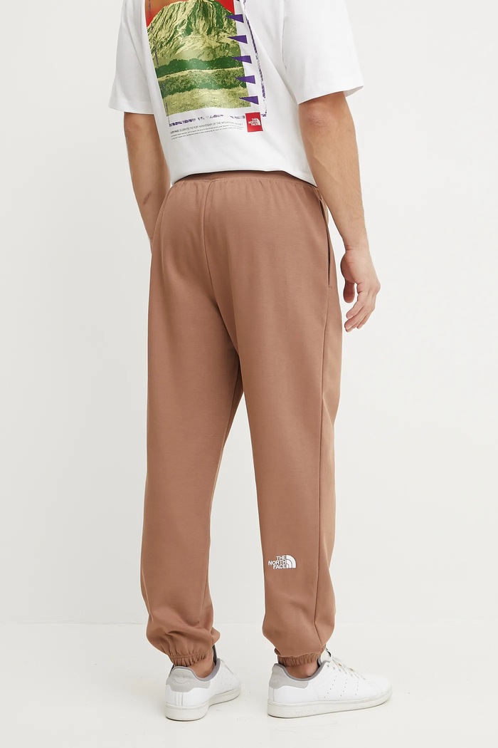 Odzież The North Face Spodnie dresowe Essential Relaxed NF0A8C1F6IH1 brązowy