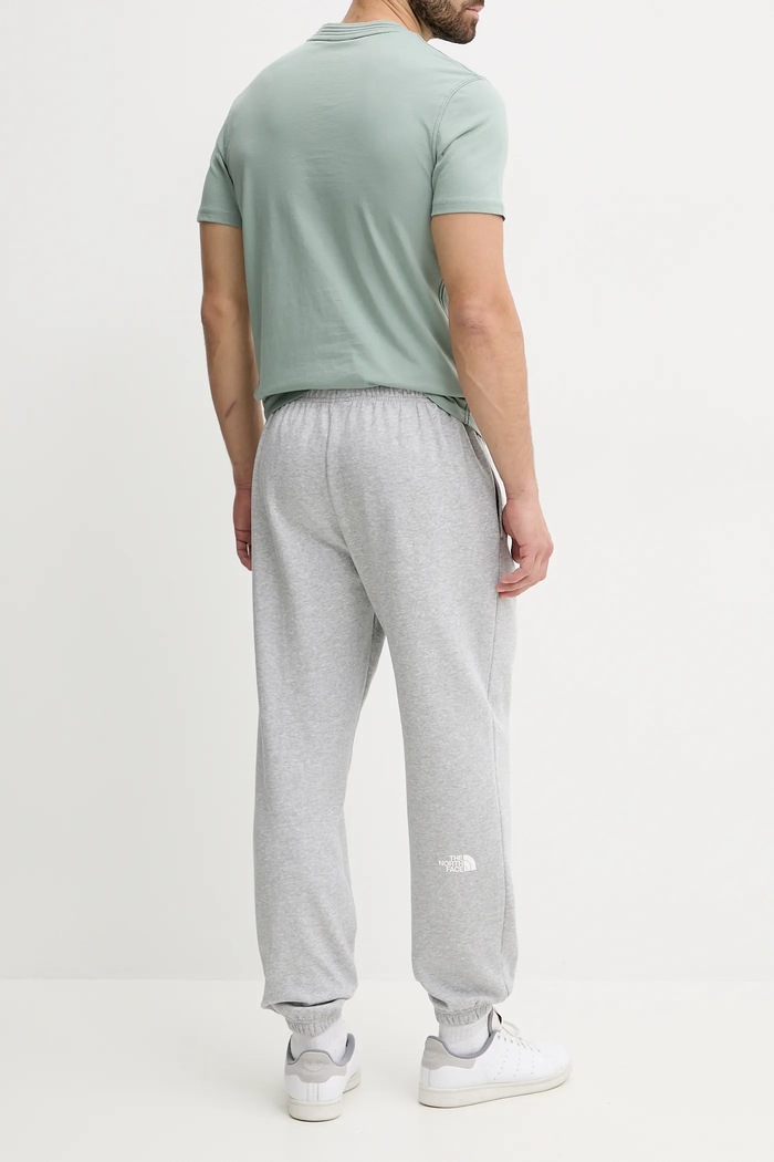 Odzież The North Face spodnie dresowe Simple Dome NF0A8C1WDYX1 szary