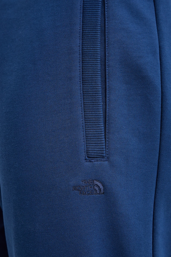 The North Face spodnie dresowe bawełniane Dome Relaxed granatowy NF0A8C3SD1R1