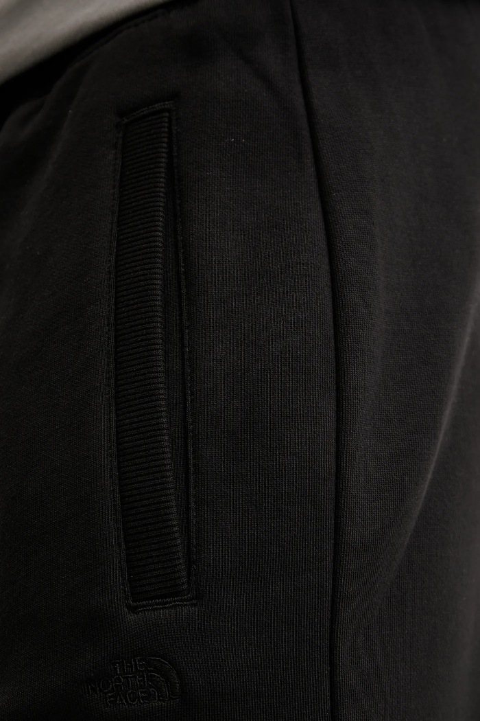 The North Face spodnie dresowe bawełniane Dome Relaxed czarny NF0A8C3SJK31